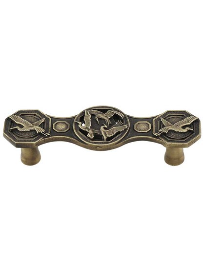 Crane Dance Drawer Pull in Antique Brass.